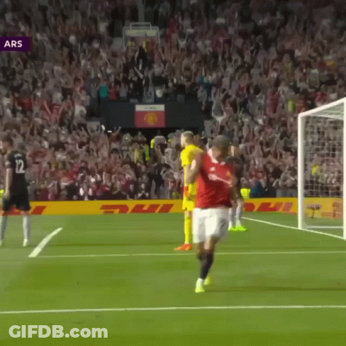 Soccer Player In Red Shirt Number 12 On Shorts GIF