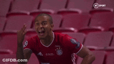 Soccer Player In Red Shirt Screaming In Stadium GIF