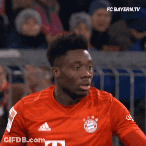 Soccer Player In Red Shirt With Letter T GIF