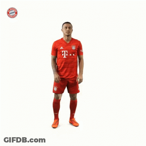 Soccer Player In Red Shirt With Letter T GIF