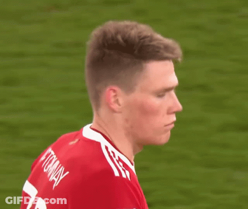 Soccer Player In Red Shirt With White Stripes GIF