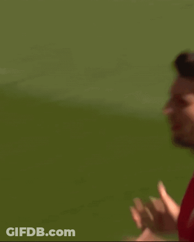 Soccer Player In Red Standard Chartered Jersey GIF
