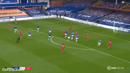 Soccer Player In Red Standard Chartered Shirt Sitting GIF