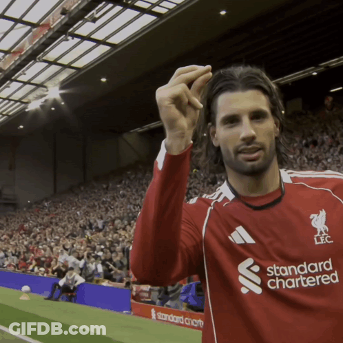 Soccer Player In Red Standard Chartered Shirt GIF