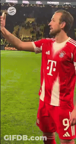 Soccer Player In Red T-Mobile Jersey Taking Selfie GIF