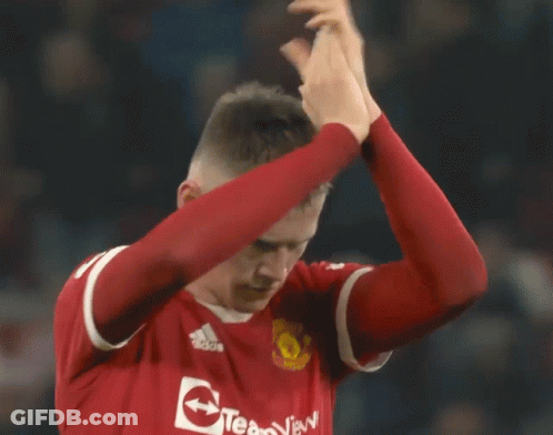 Soccer Player In Red TeamViewer Jersey Applauding GIF