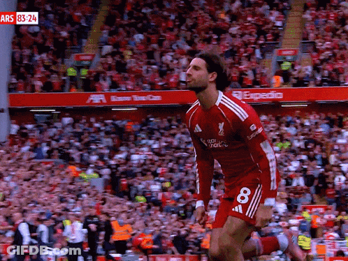 Soccer Player In Red Uniform Number 8 GIF