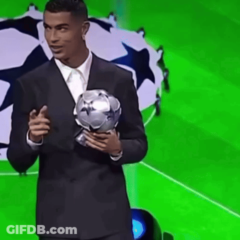 Soccer Player In Red Vodafone Jersey Smiling GIF