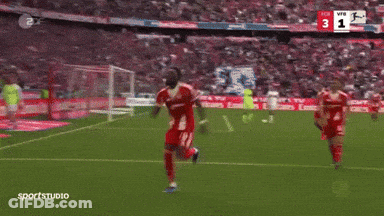 Soccer Player In Striped Shirt In Front Of Heineken Sign GIF
