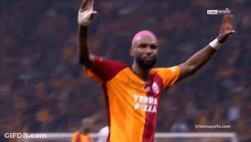 Soccer Player In Terra Pizza Jersey Celebrating Goal GIF