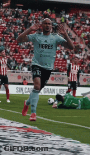 Soccer Player In Tigres Shirt Jumping GIF