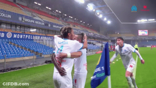 Soccer Player In Uber Eats Jersey Kicking Ball GIF