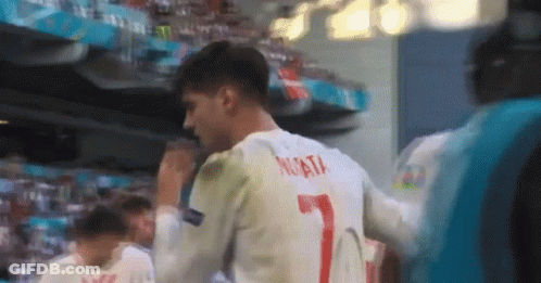 Soccer Player In White #7 Jersey Facing Crowd GIF