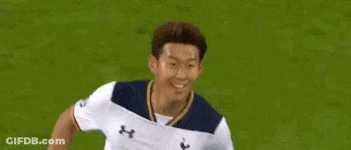 Soccer Player In White AIA Jersey Running GIF