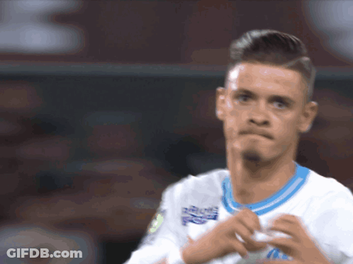 Soccer Player In White Allianz Jersey With Blue Collar GIF