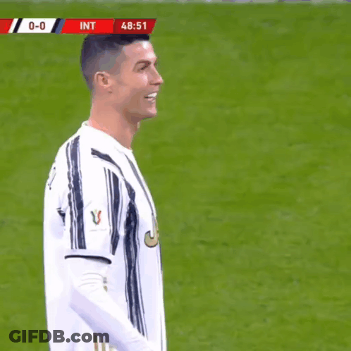 Soccer Player In White And Black Striped Jersey Smiling GIF