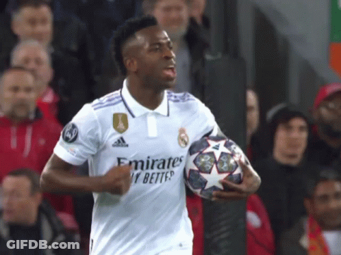 Soccer Player In White Emirates Jersey Holding Ball GIF