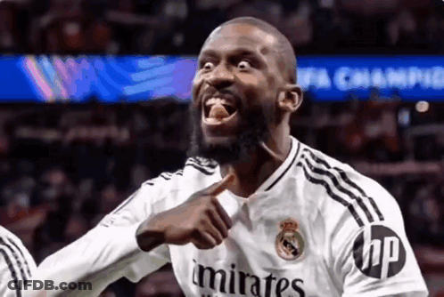 Soccer Player In White Emirates Jersey Pointing At Camera GIF