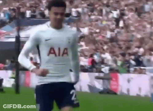 Soccer Player In White Jersey And Blue Shorts GIF