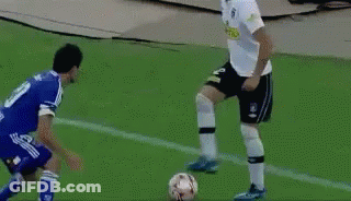 Soccer Player In White Jersey Kicking Ball GIF