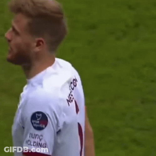 Soccer Player In White Jersey Number 6 Standing On Field GIF