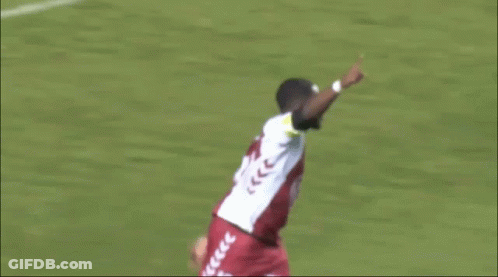 Soccer Player In White Jersey With Arrows Thumbs Up GIF