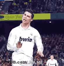Soccer Player In White Jersey With Bwin Running GIF