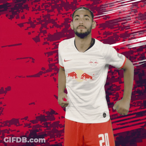 Soccer Player In White Jersey With Red Bull GIF