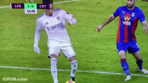 Soccer Player In White Jersey With Sbotop GIF