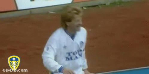 Soccer Player In White MAJ Jersey Arms Up GIF