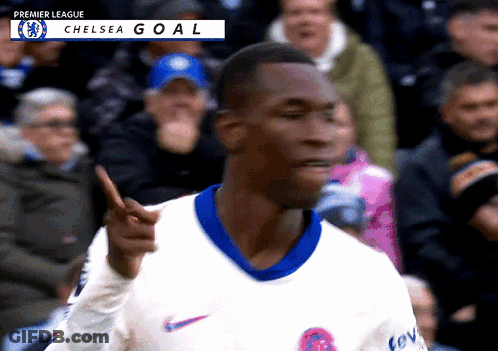 Soccer Player In White Nike Jersey Points To Audience GIF