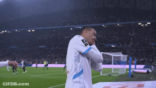 Soccer Player In White Shirt With Blue Stripe Saying UEFA GIF