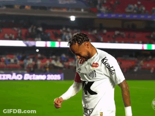 Soccer Player In White Shirt With Kicalda On Sleeves GIF