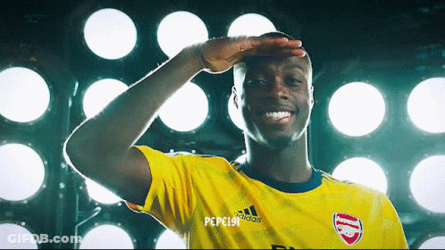 Soccer Player In Yellow Adidas Shirt Salutes GIF