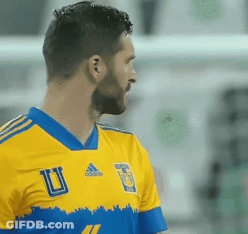 Soccer Player In Yellow And Blue Jersey GIF