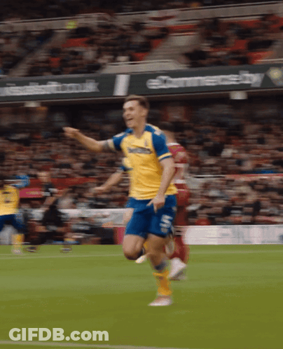 Soccer Player In Yellow And Blue Santander Jersey GIF