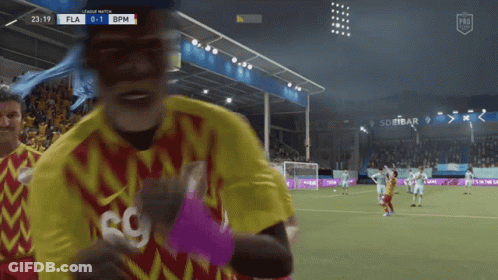 Soccer Player In Yellow And Red Jersey With SG GIF