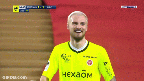 Soccer Player In Yellow Hexaom Jersey GIF