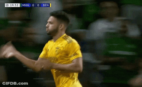 Soccer Player In Yellow Jersey Celebrates Goal Against Ben GIF
