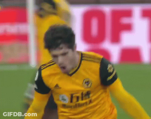 Soccer Player In Yellow Jersey Celebrating Goal GIF