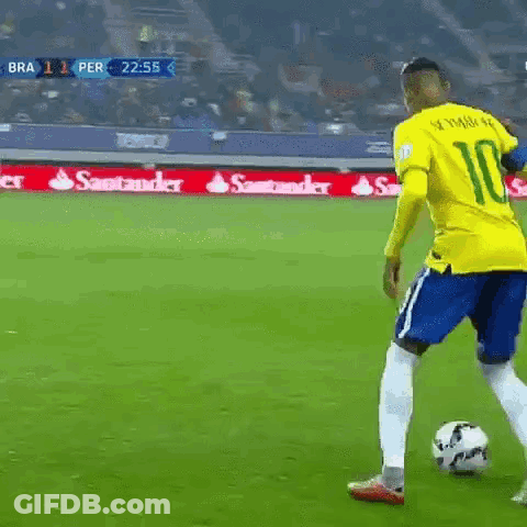Soccer Player In Yellow Jersey Kicking Ball GIF