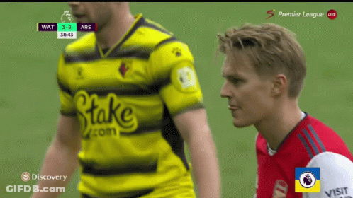Soccer Player In Yellow Jersey Next To Another Player GIF