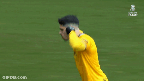 Soccer Player In Yellow Jersey Number 1 GIF
