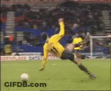 Soccer Player In Yellow Jersey Number 11 Falling GIF