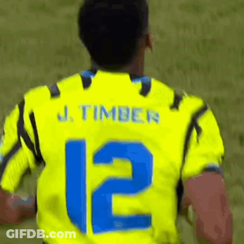 Soccer Player In Yellow Jersey Number 12 Running GIF