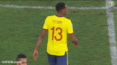 Soccer Player In Yellow Jersey Number 13 GIF