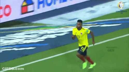 Soccer Player In Yellow Jersey Number 13 GIF