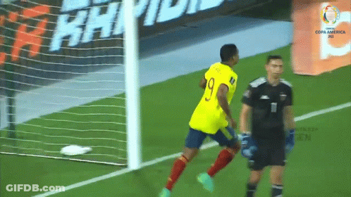 Soccer Player In Yellow Jersey Number 9 GIF