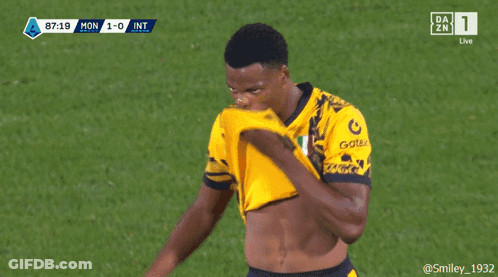 Soccer Player In Yellow Jersey Raising Arm GIF