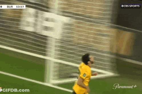 Soccer Player In Yellow Jersey Running Towards Goal On Paramount Plus GIF